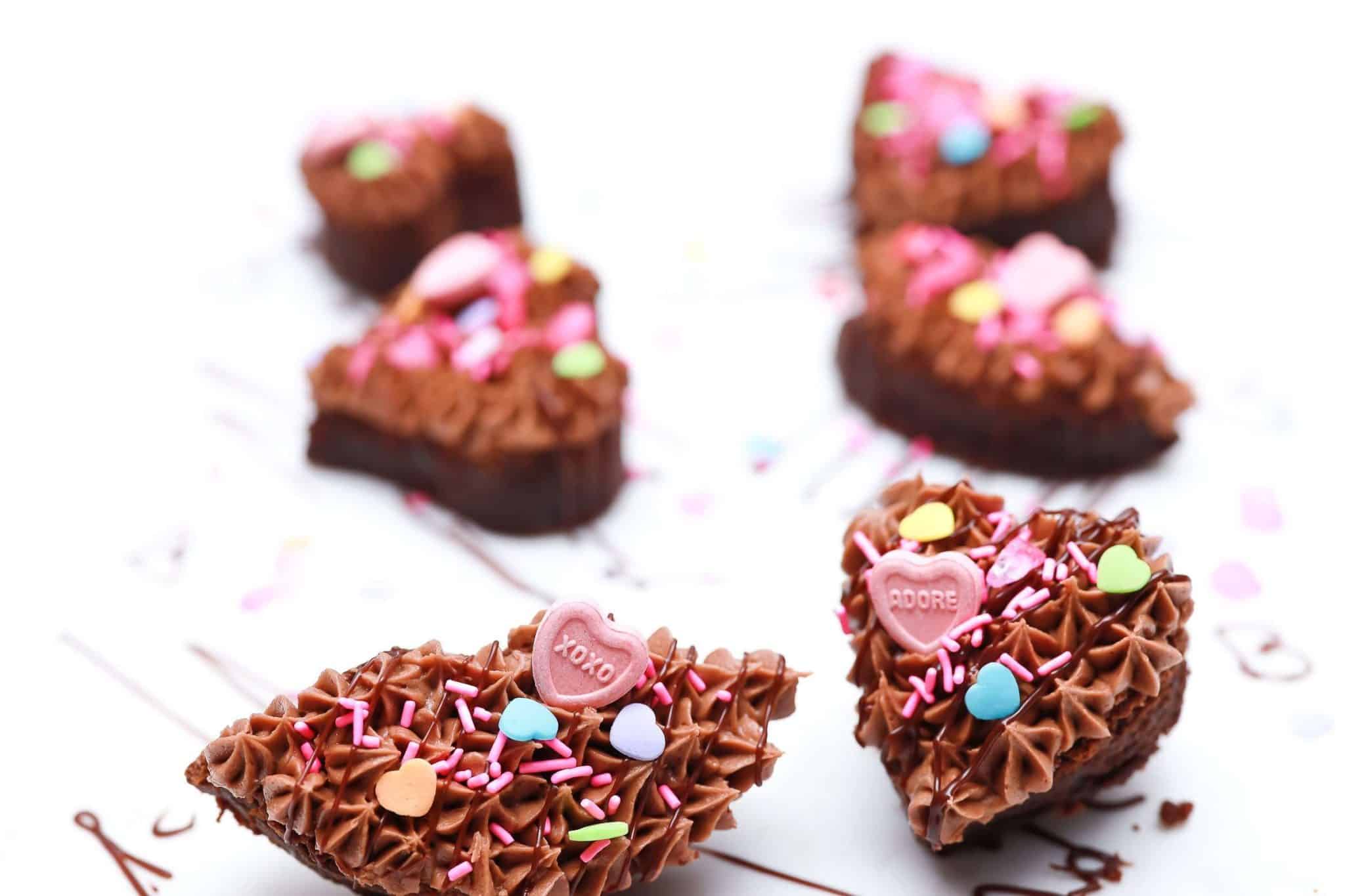 nutella brownies in valentines hearts and lips shapes with valentines sprinkles