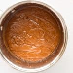 Melted Biscoff spread whisked into toffee mixture
