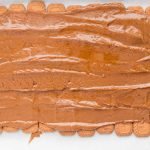 Toffee spread over crackers before adding chocolate