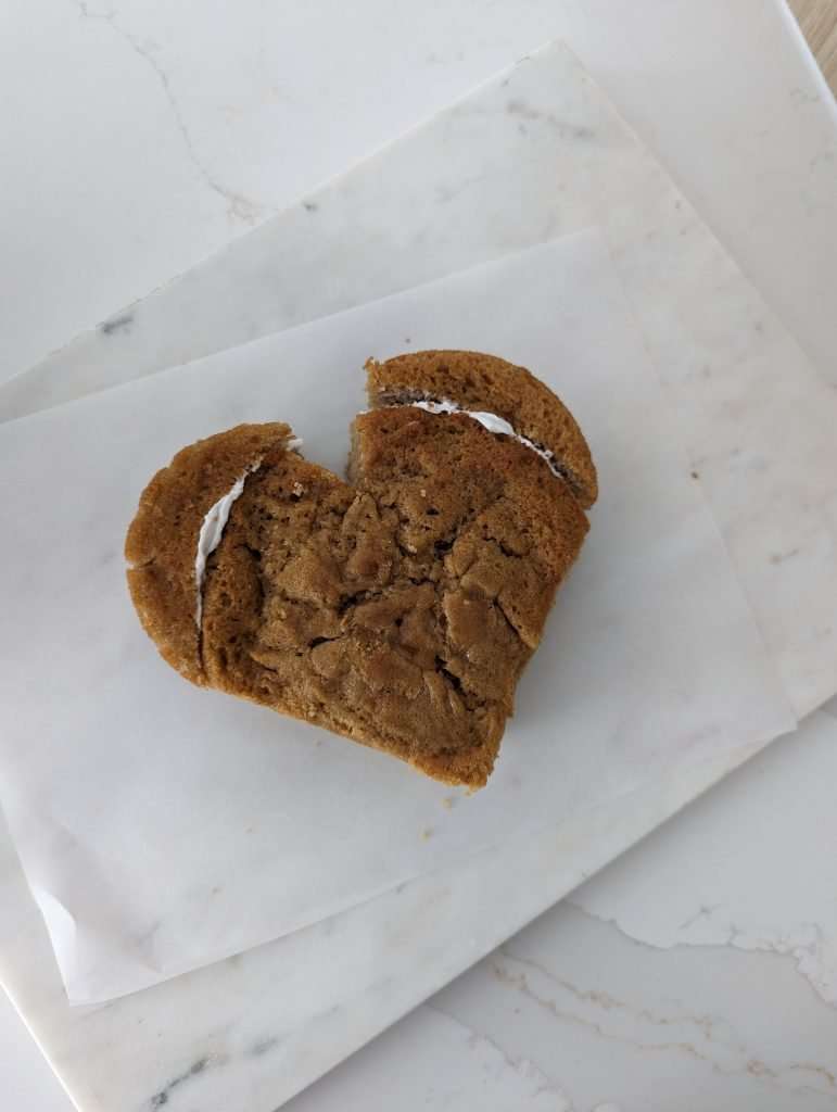 heart cake glue sides with buttercream