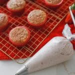 pipe buttercream on strawberry crunch cupcakes using wilton 1M star tip