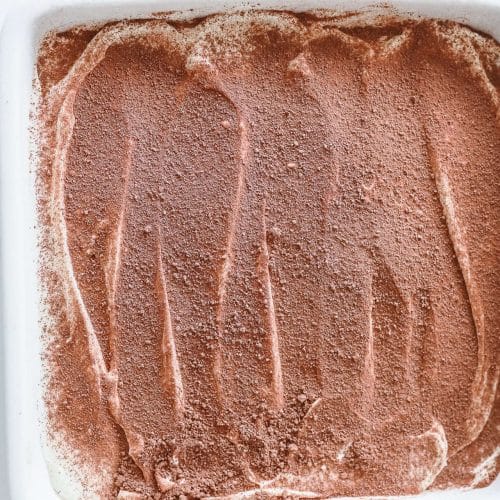 Step 4: assembling tiramisu,dust with cocoa