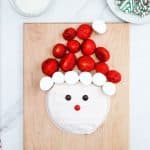 STEP-8_STRAWBERRIESCANDIES_santa-buttercream-board-