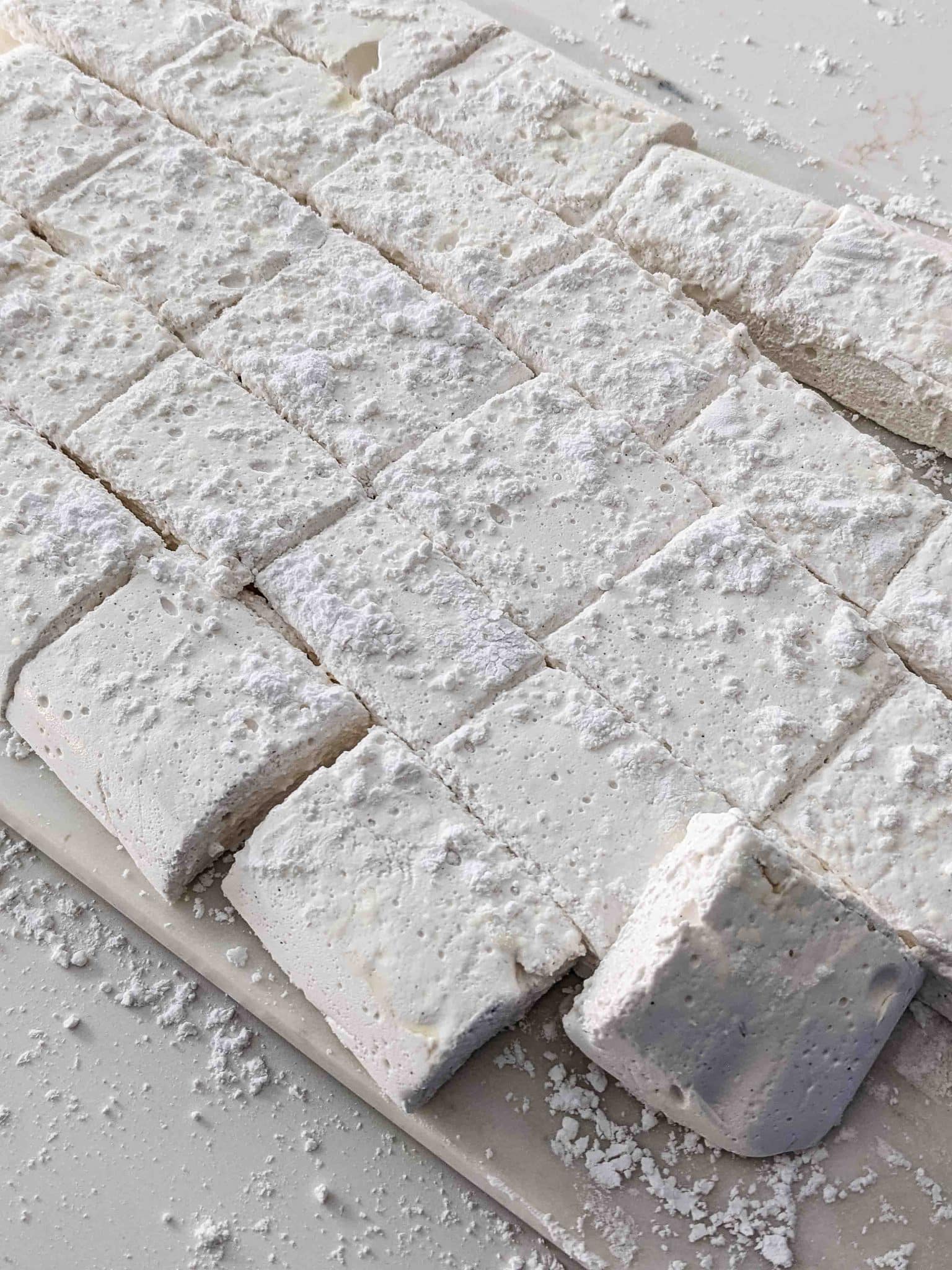 vanilla bean marshmallows sliced on white surface