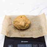 Birthday cake cookie on scale