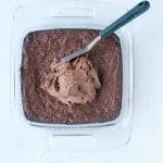 spreading frosting on espresso martini brownies