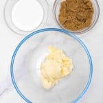 butter, brown sugar and flour in bowls for easy hot chocolate cookies