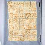 baking sheet lined with saltine crackers for reindeer toffee