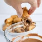 dip ends of cannoli shells in chocolate