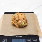 scoop and weigh cookies on kitchen scale