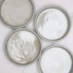 four 6" cake pans greased