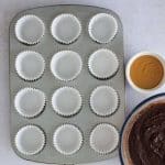 snickers cupcakes muffin pan lined with liners