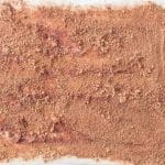 Brown sugar and cinnamon sprinkled over buttered dough for tangzhong cinnamon rolls