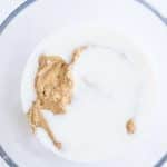 dry and wet ingredients being mixed for lemon honey cupcakes
