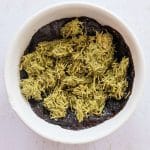 Microwave dubai chocolate protein brownie mug cake with Spoon the kataifi-pistachio mixture