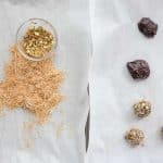 Dubai chocolate pistachio energy balls being dipped in pistachio coating and kataifi layer