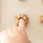 Use a straw or your pinky to create a small hole in the center for the classic Samoa shape.