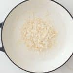 Coconut oil and coconut flakes In a medium-sized pan