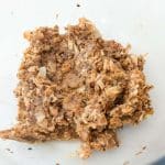 close up of healthy samoa cookie dough with dates mixed with coconut