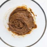 sunflower seed butter, coconut sugar, flax egg, and vanilla whisked in clear bowl until smooth