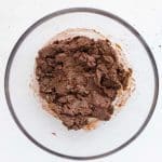 protein powder, almond flour, baking soda, and salt added into clear bowl and mixed