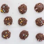 monster mash protein cookie dough scooped inot 9 cookies on baking sheet