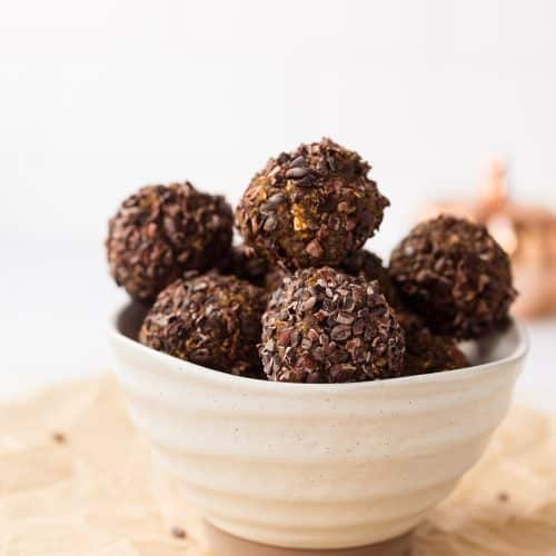 PUMPKIN SPICE ENERGY BALLS IN WHITE BOWL