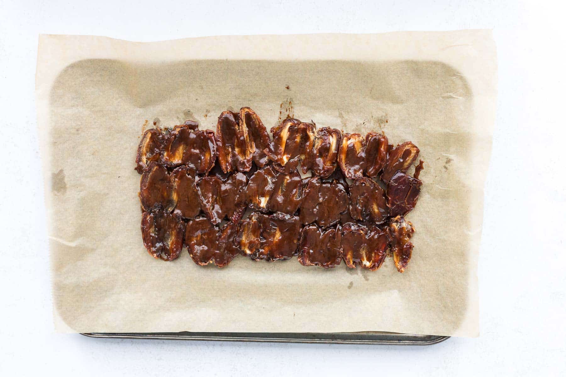 coconut sugar toffee layer baked on top of date layer for making  Christmas Crack Date Bark