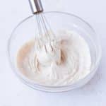 Mixing cream cheese for protein frosting