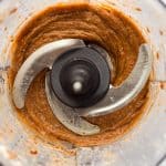 Dates, coconut milk, melted nut butter, vanilla, and salt blended into caramel in food processor.