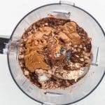 blending ingredients for Baileys chocolate protein truffles in food processor