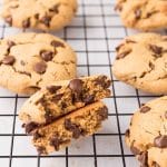 Close up of chewy chocolate chip protein cookie showing soft center and melted chocolate