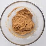 Cassava flour, almond flour, vanilla protein powder, and baking soda added to cookie dough mixture