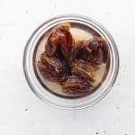 pitted dates in bowl with boiling water to softern