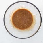 whisk together coconut sugar, maple syrup, olive oil, egg, and vanilla until smooth for the date cake