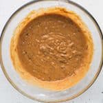 Add the mashed date mixture into the wet ingredients and stir to combine for the date cake