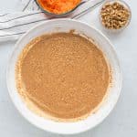 Add the wet ingredients to the dry for the mini carrot cakes