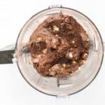 Folding chopped mini eggs into chocolate protein mixture