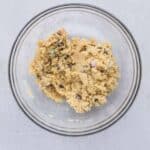 Almond flour, coconut flour, maple syrup, and coconut oil mixed to make cookie dough layer