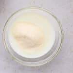 Gelatin blooming in milk for High Protein No Bake Biscoff Cheesecake