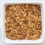 Crumble added evenly over the fruit ready to bake peach blueberry cobbler