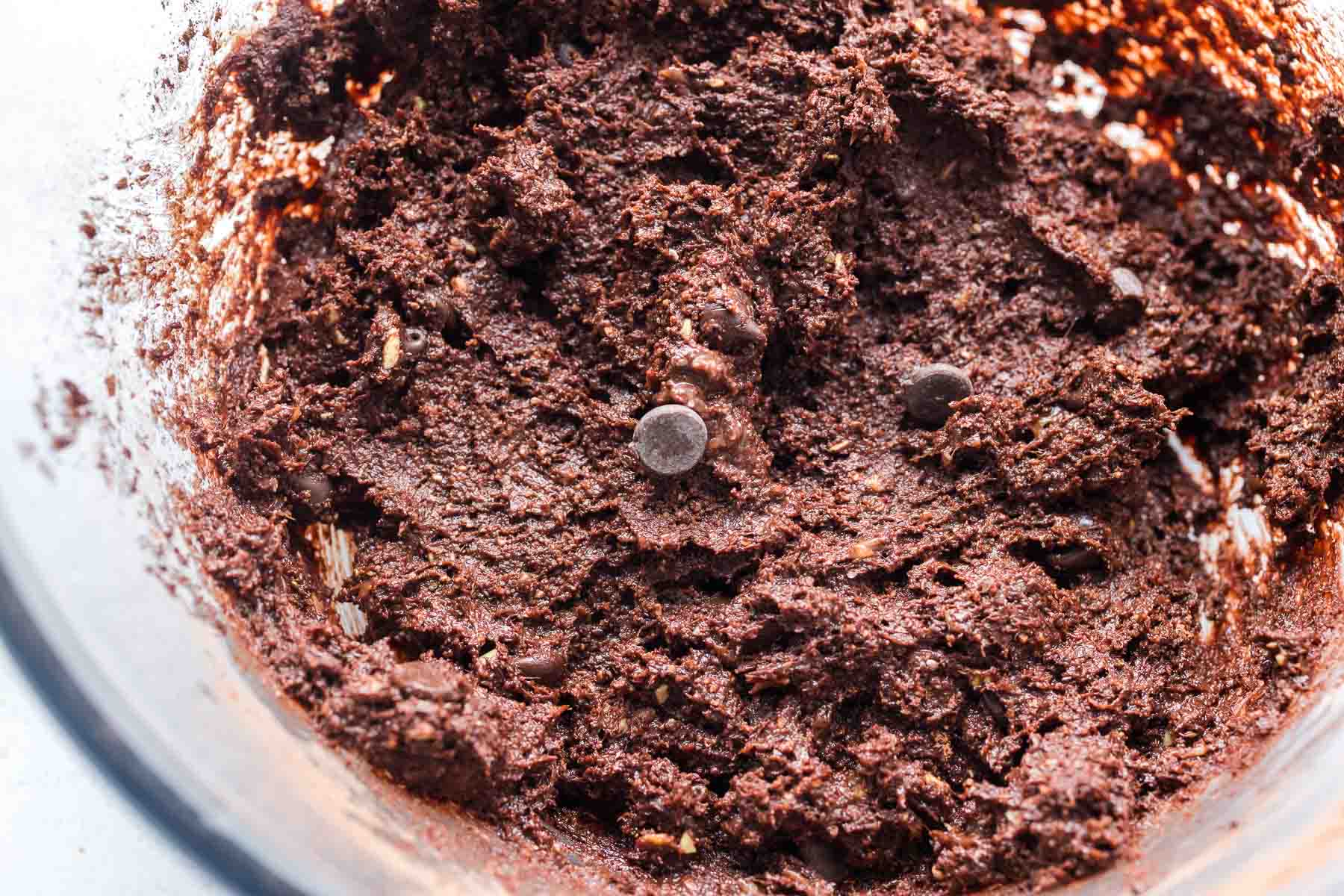 chocolate chips folded into fudgy banana chocolate cookie batter