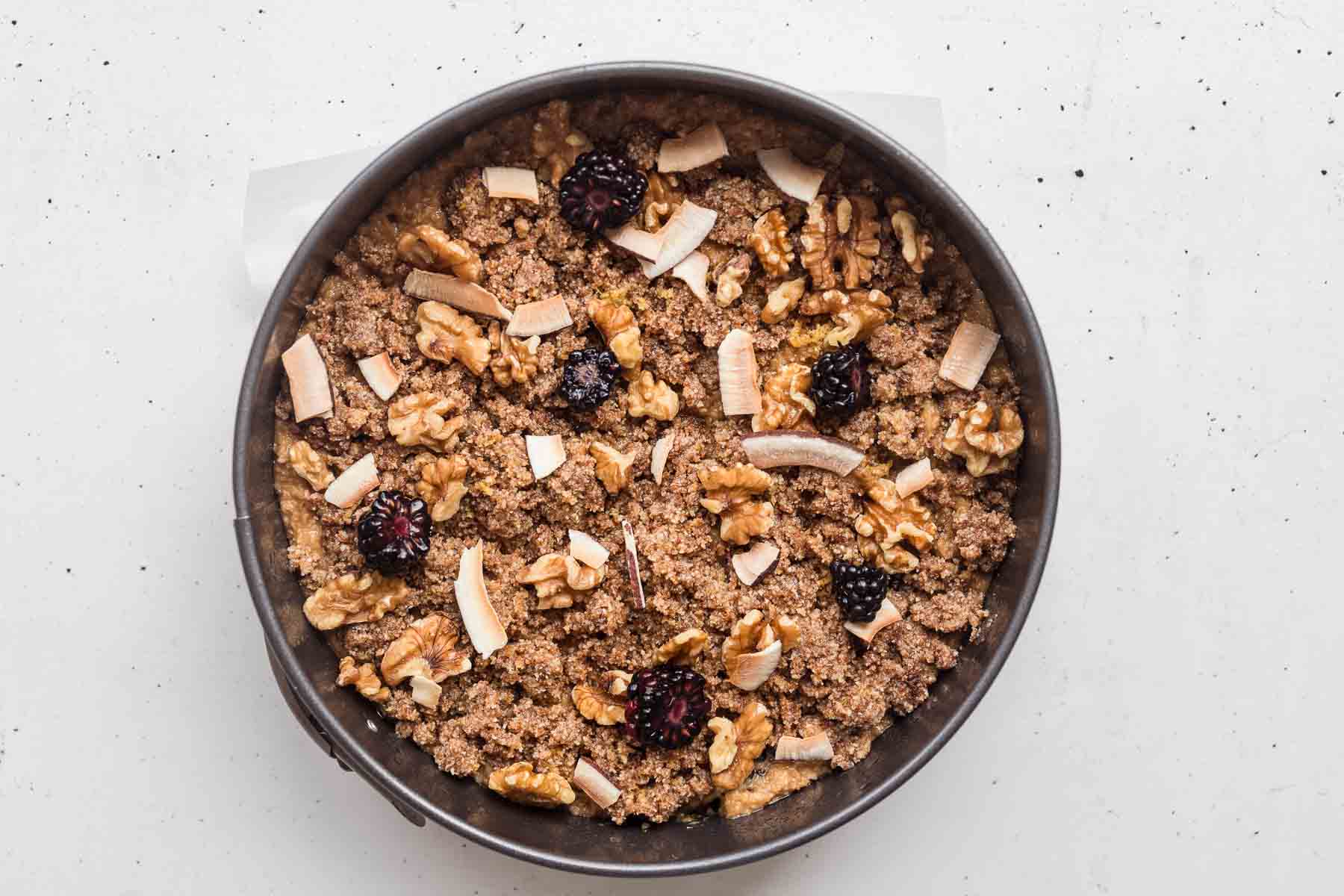 Blackberry Sour Cream Coffee Cake with streusel topping in springform pan ready to bake