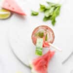 Watermelon Mint Mojito Mocktail garnished with watermelon
