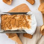 Biscoff spread swirled into homemade high protein ice cream before freezing.