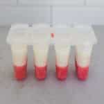 white layer added to popsicle mold for red, white and blue popsicles