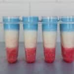 blue layer added in popsicle mold for red, white and blue popsicles