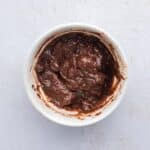 high protein brownie mug cake ingredients mixed in mug