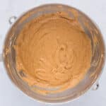 Pumpkin muffin batter mixed and ready for chocolate chips