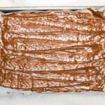 chocolate spread over hot toffee layer for reindeer Christmas toffee